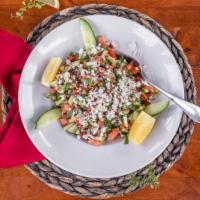 Shepherd Salad · Vegetarian. Roma tomatoes, cucumbers, red onions, bell peppers and parsley tossed with red w...
