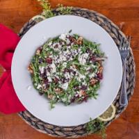 Arugula Salad · Vegetarian. Arugula mixed with field greens, dried cranberries, walnuts and crumbled feta ch...