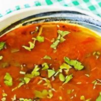 Rasam/Lentil Soup · Lentil soup flavoured with herbs, mild Indian spices.