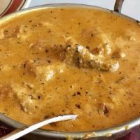 Lamb Korma · A mild curry prepared with almond and cashew sauce.
