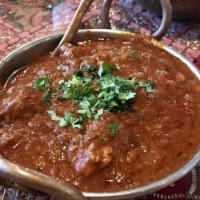 Lamb Curry · Lamb cooked in onion tomato gravy.
