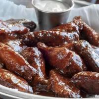 Smoked Chicken Wings · Six pieces. Wings seasoned with Gs rub, slow smoked, and tossed in your choice of sweet, hot...
