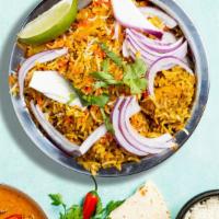 Veggie Delight Biryani · Mixed fresh vegetables combined with paneer, green peas, butter, long grain basmati rice and...