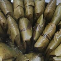 Tamales Oaxaquenos 1/2Dz · 1/2 dozen handmade tamales wrapped in banana leaves. 
Choose your flavor from the options be...