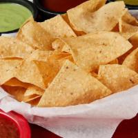 Chips & Salsa · Fresh corn tortilla chips and our in-house made tomato based salsa.
