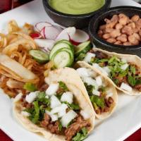 Authentic Street Tacos · (Order of 3) Your choice of meat. Topped with onion & cilantro. Served with a side of your c...