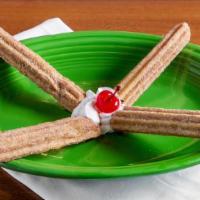 Mexican Churros · filled with cream and coated with cinnamon-sugar.