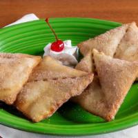 Sopapillas · This is a soft, inflated flour tortilla lightly deep fried covered with cinnamon-sugar and h...