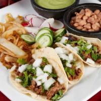 Authentic Street Taco (1) · Single taco topped with your choice of meat, onion and cilantro.