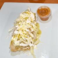Tamale · Single in-house made tamale stuffed with the filling of your choice topped with cabbage and ...