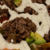 Nachos Con Carne · With Meat.