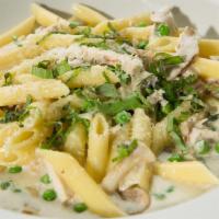 Penne Rustica · Light cream sauce, peas and mushrooms on penne pasta.