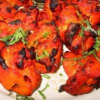 Tandoori Chicken Tikka Bbq · Ground chicken mixed with crushed vegetables, Our House spices, Charcoal grilled in our tand...