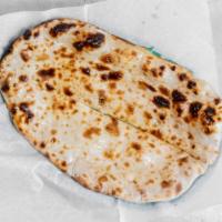 Naan · Leavened flatbread made from white flour baked in our tandoor. South Asia's most popular bre...