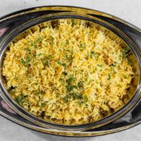 Chicken Biryani · A Mughlai dish prepared with chicken and green peas with saffron flavorful rice, garnished w...