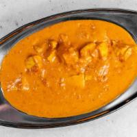 Chicken Makhani · Tender boneless pieces of chicken cooked in a fresh tomato sauce with a touch of light cream...