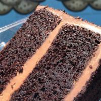 Chocolate Crunch Cake · The best chocolate cake layered with chocolate cream cheese frosting!