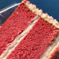 Strawberry Crunch Cake Slice · Sweet Strawberry cake layered with buttercream frosting and covered in strawberry crunch.