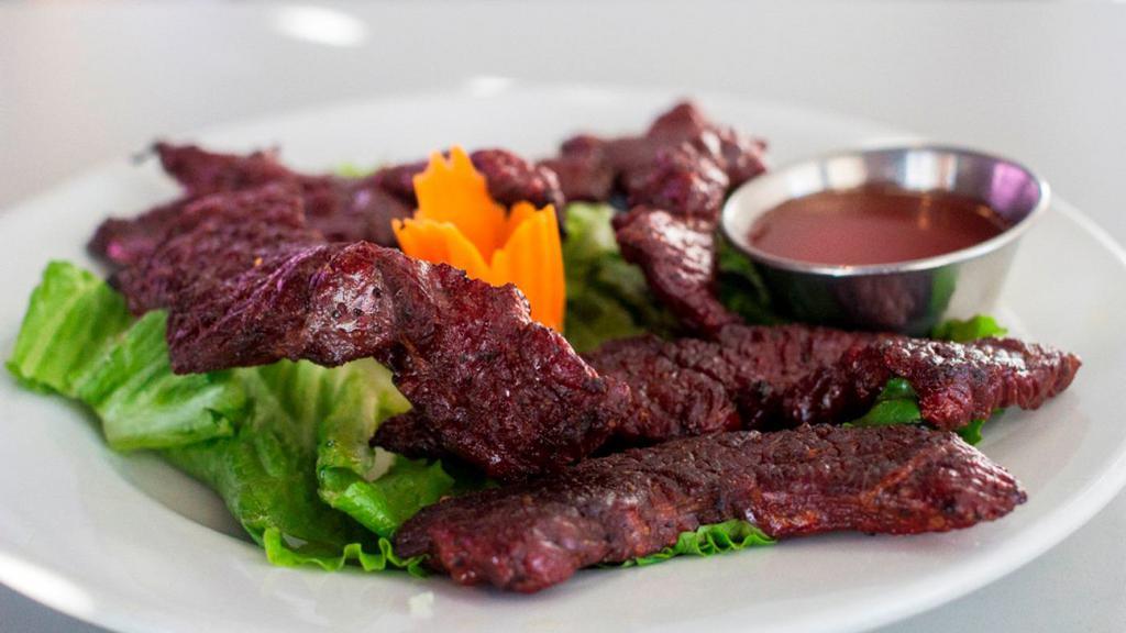 Thai Style Beef Jerky · Beef tenderloin marinated in Thai spices and dried over slow heat.