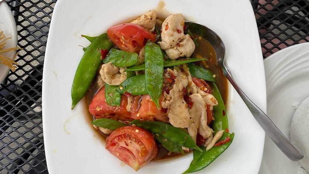 Snow Pea Pods With Tomatoes · Tomatoes add a wonderful rich flavor to this dish.
