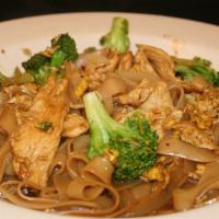 Pad See Yew · Stir fried wide rice noodles, egg and broccoli.