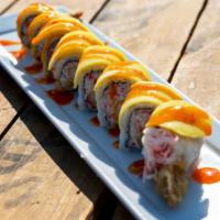 Mango Roll · Shrimp tempura, crab meat, top with mango, sweet chili.