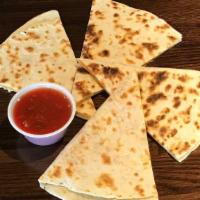 Quesadilla · Toasted and melted on the griddle. Perfect! Add some protein (optional).