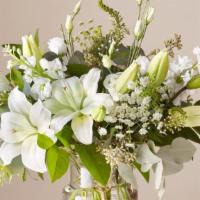 Ftd Alluring Elegance  Bouquet · Garden style vase of flowers.
