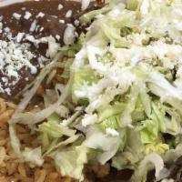 Enchiladas (2) · Servido con arroz y frijoles. Enchiladas Poblanas/ Verdes o Rojas / Served with rice and bea...