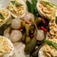 Mama'S Deviled Eggs · Served with pepper ceviche and fresh scallion.