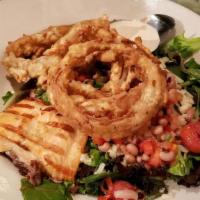 Salmon Salad · Grilled salmon over mixed field greens with a spicy buttermilk dressing, black-eyed pea reli...