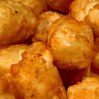 Tots · Fried grated potatoes.