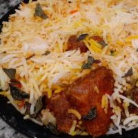 Biryani · Your choice of protein mixed with seasoned long grain basmati rice and topped with crispy fr...