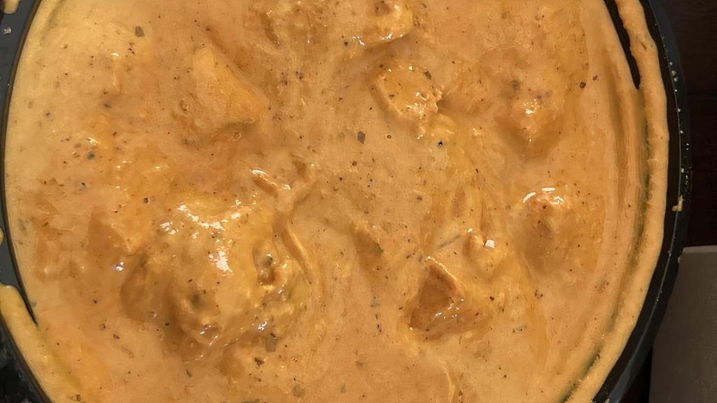 Chicken Tikka Masala · Popular. marinated boneless chicken smoked in a tandoori and sautéed with creamy tomato/cashew sauce (w/ rice).