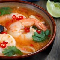 Tom Yum Soup · Clear soup with lime juice, mushrooms, lemongrass, scallion, cilantro.