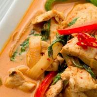 Red Curry · Red curry paste, coconut milk, bamboo shoots, bell peppers, and basil.