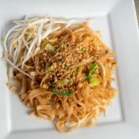Pad Thai · Rice noodle sautéed with egg, scallion, beansprouts, and topped with crushed peanuts.