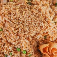Chicken Fried Rice  · *Eggs cannot be removed. 
Fried rice with egg, peas, white and green onions. Served with one...