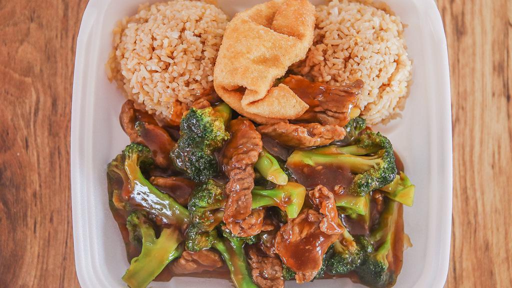 Beef Broccoli  · Beef with some broccoli mixed with brown sauce. Served with rice and one Crab Rangoon.