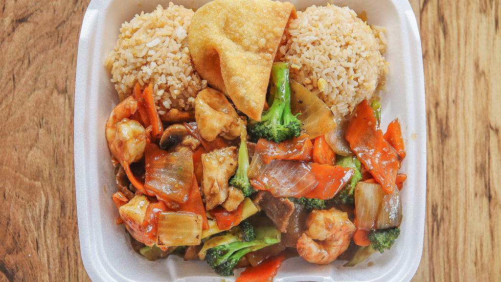 Combo Teriyaki · Stir fried dish with chicken, shrimp, beef, broccoli, carrot, mushroom, and onions. Sautéed in teriyaki sauce. 
Served with rice and one crab rangoon.