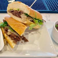 PhoʻRench Dip · Thinly sliced beef, grilled onion, jalapeño, cilantro, basil, sriracha mayo, hoisin, cup of ...