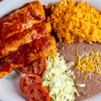 Enchilada Dinner
 · 3 tortillas rolled around in your choice of red or green sauce. accompanied by rice and bean...