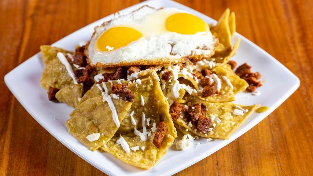 Chilaquiles · Sauteed tortilla chips with your choice of Red or Green sauce. 2 Eggs your way topped off with Mexican fresh cheese and drizzle of sour cream.