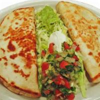 El Paso Special  · Two quesadillas (one chicken, one beef). served with pico de gallo, sour cream, and guacamol...