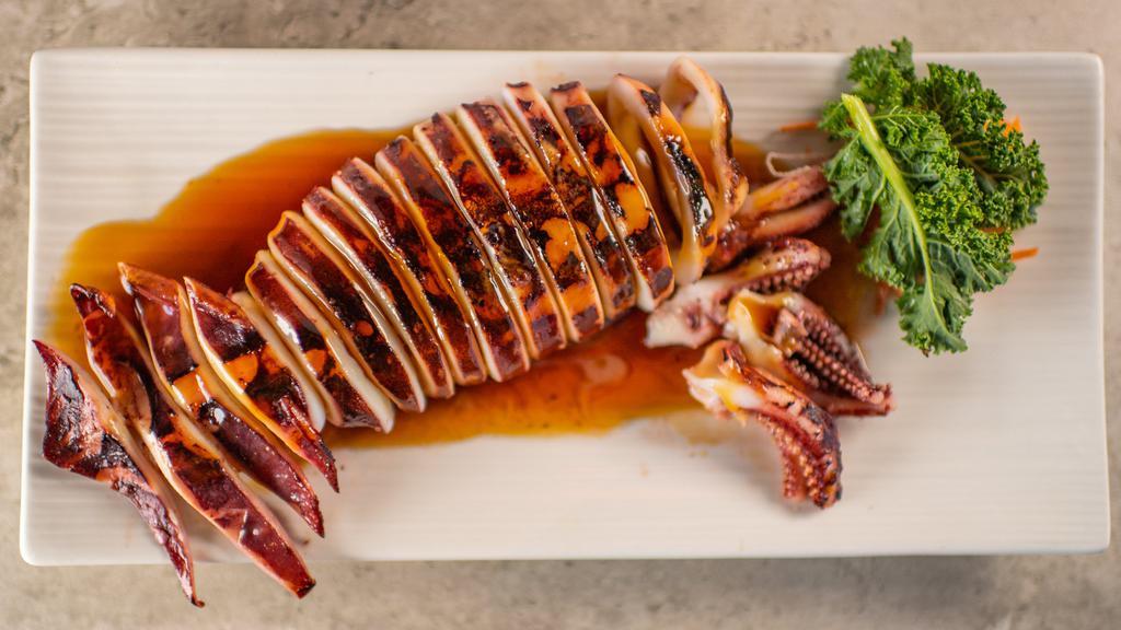 Calamari · Barbecued squid served with sauce.