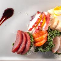 Sashimi Dinner Regular (With Rice) · 12 pieces assorted raw fish, chef's choice.