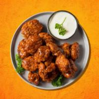 Boneless Buffalo Wings · Boneless chicken wings with choice of your favorite wing style. Served with blue cheese or r...