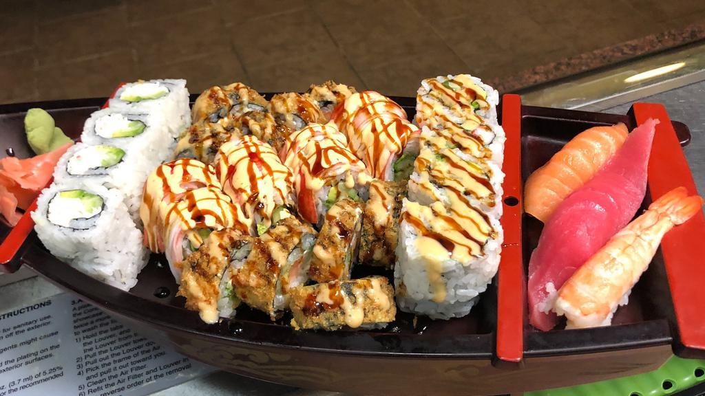 Sushi Boat · 3 pcs of nigiri, California roll, Broken arrow roll, Alaska roll, (Crunch California roll or Vegas roll), 2 Miso soups.
