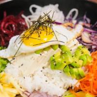 Vegan Rice Bowl · Varity of fresh vegetables, Tofu on top of steamed rice with sweet Korean red pepper paste