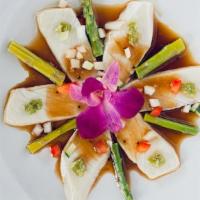 Butterfish Tataki · seared super white tuna, topped with asparagus, bell peppers, cucumber, onions, ponzu dressi...